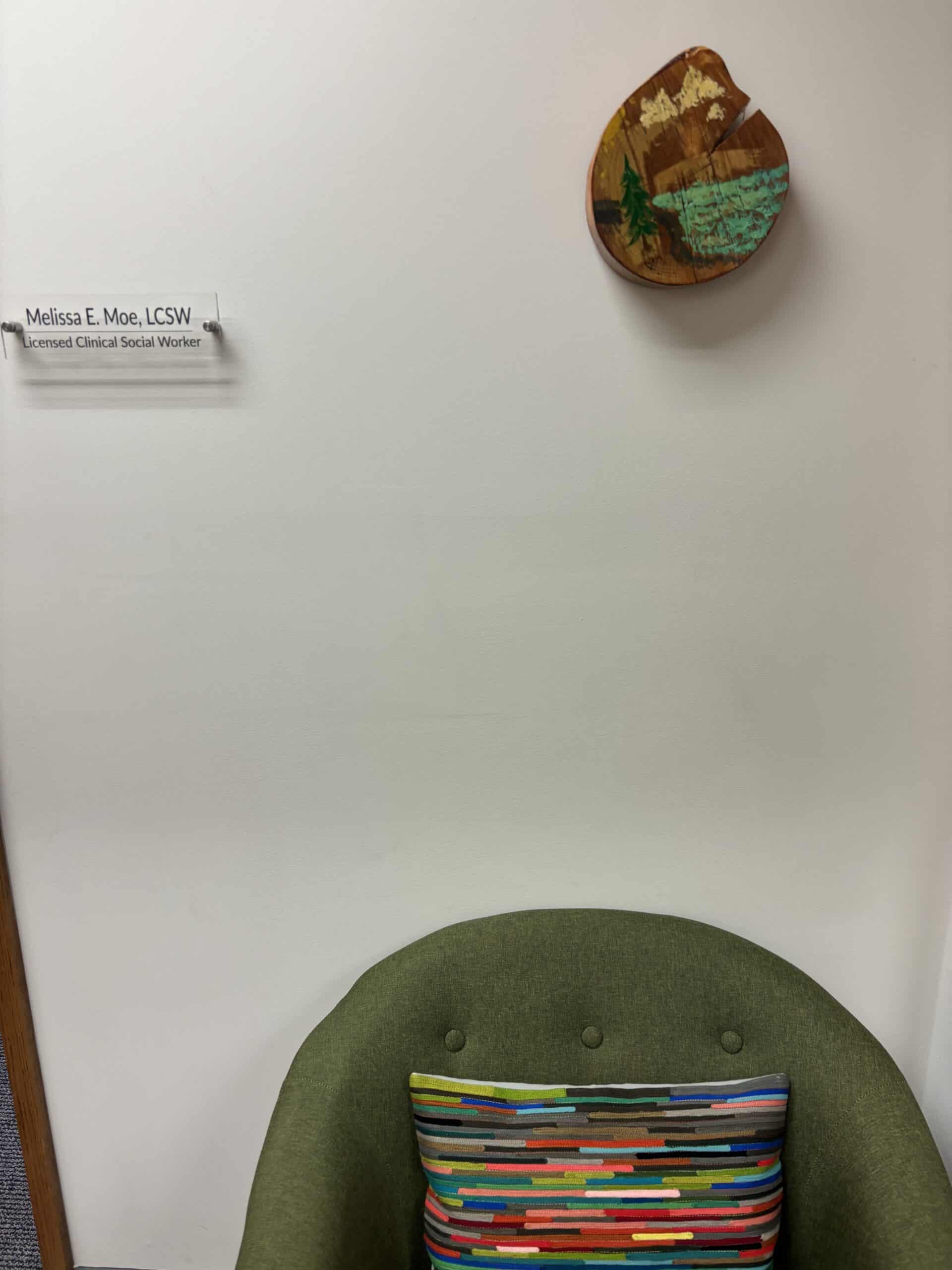 Melissa Moe LCSW credentials displayed in office